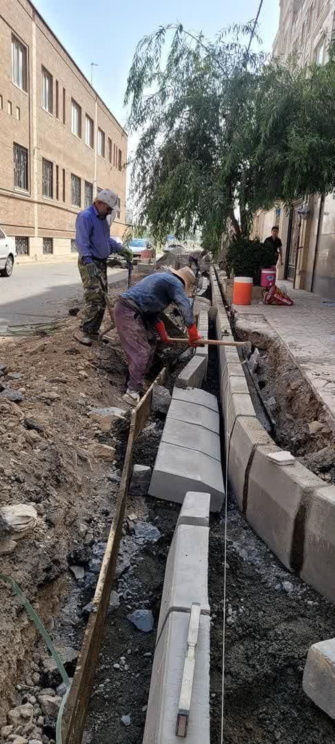 عملیات مرمت و بهسازی جداول خیابان شهادت شهرک فرزان شهرقدس